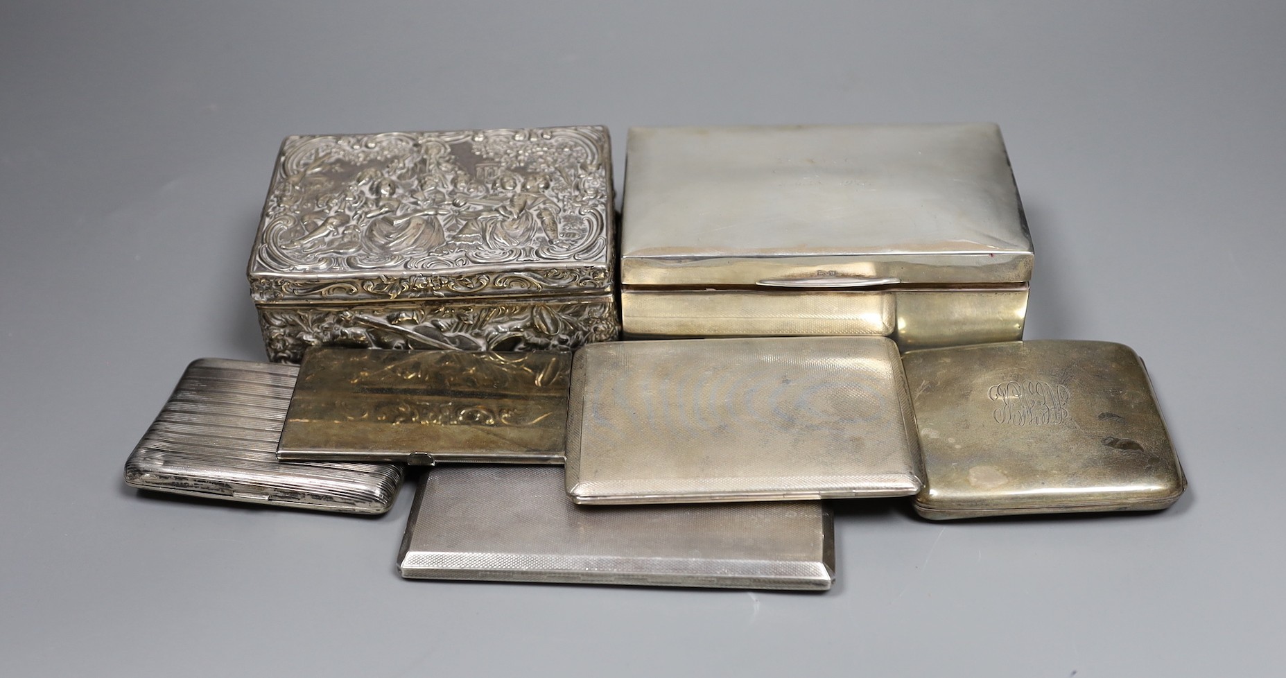 Six assorted cigarette cases or boxes, including two silver boxes, largest 14.2cm, three silver cigarette case and an 800 case and one plated card case.